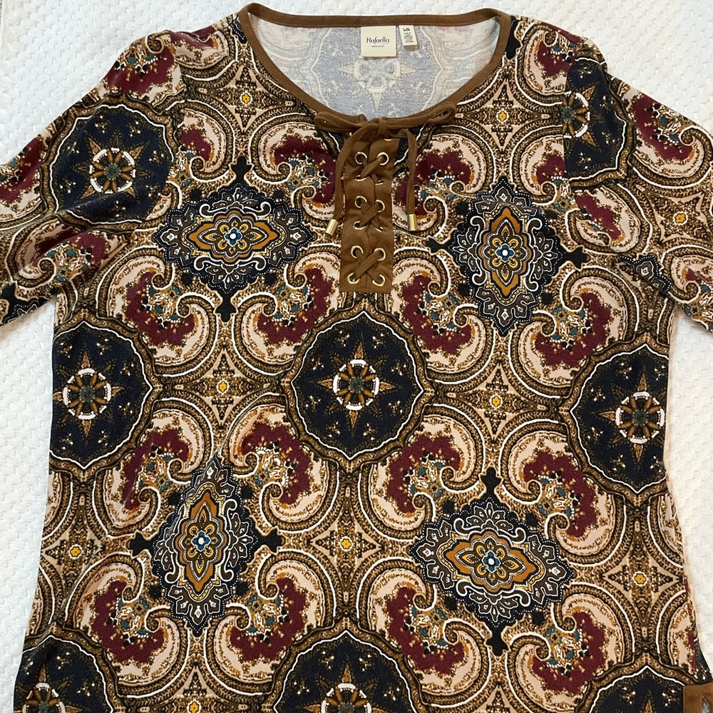 Multi colored pullover top.